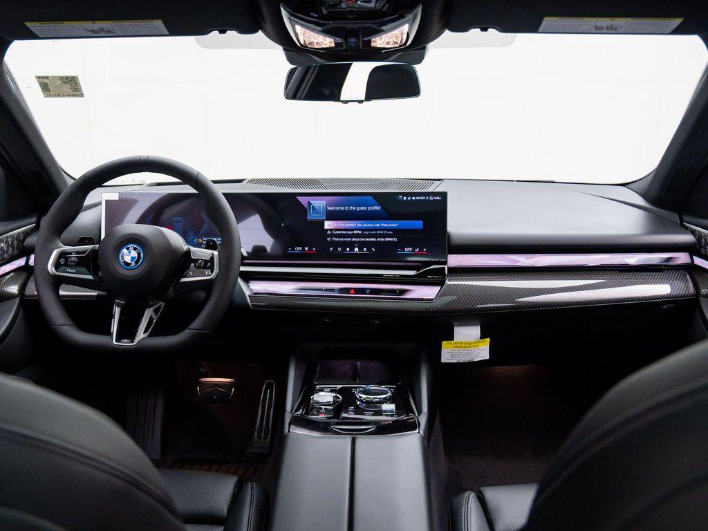 new 2026 BMW 550e car, priced at $84,060