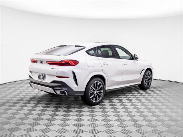 new 2025 BMW X6 car, priced at $77,875