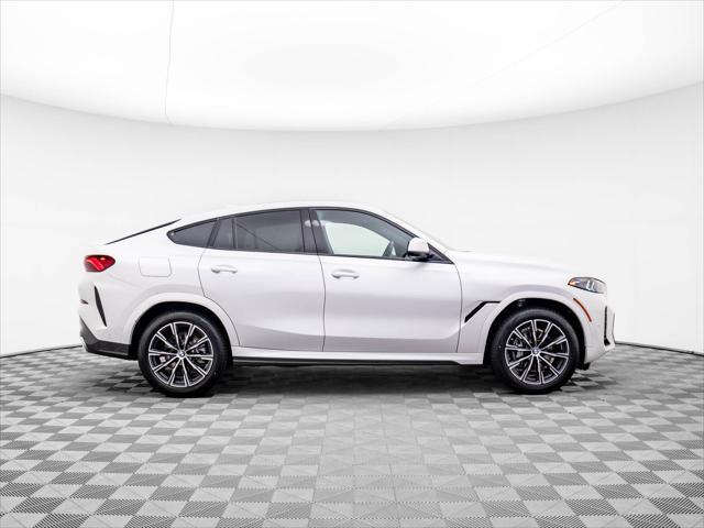 new 2025 BMW X6 car, priced at $77,875