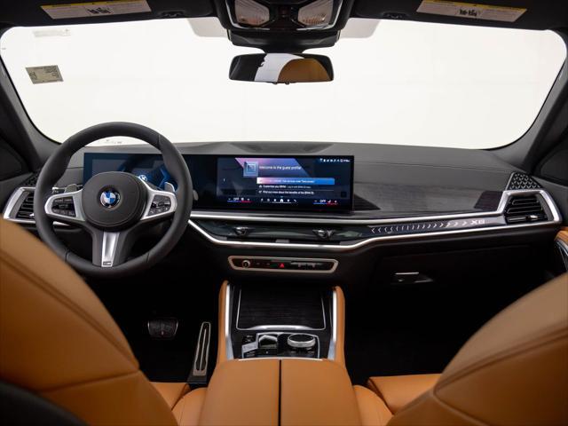 new 2025 BMW X6 car, priced at $77,875