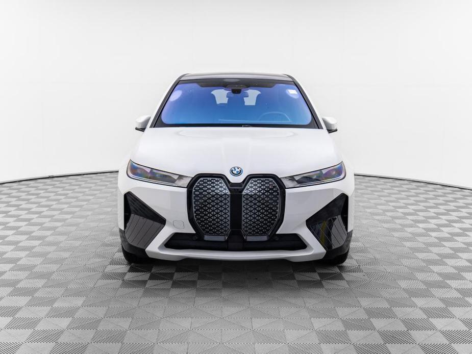 new 2024 BMW iX car, priced at $95,095