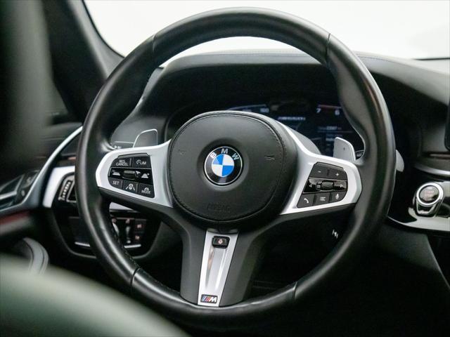 used 2022 BMW M550 car, priced at $63,300