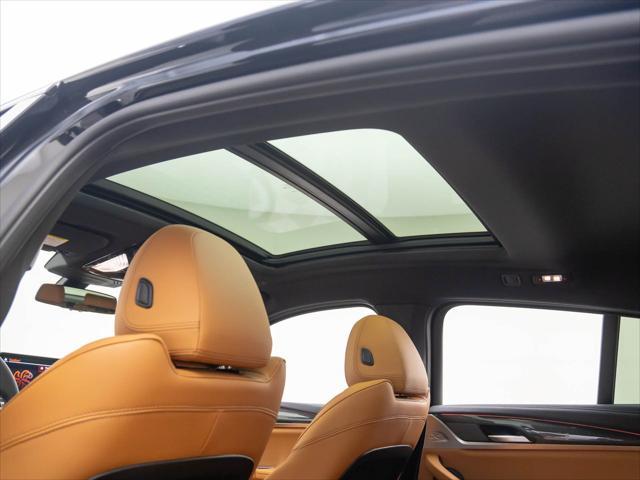 new 2025 BMW X4 car, priced at $73,015