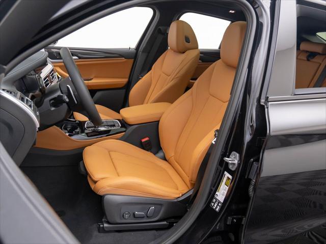 new 2025 BMW X4 car, priced at $73,015