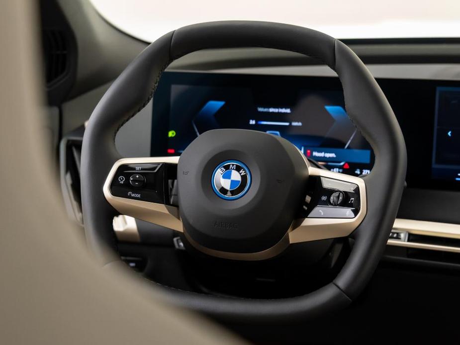 new 2024 BMW iX car, priced at $97,095
