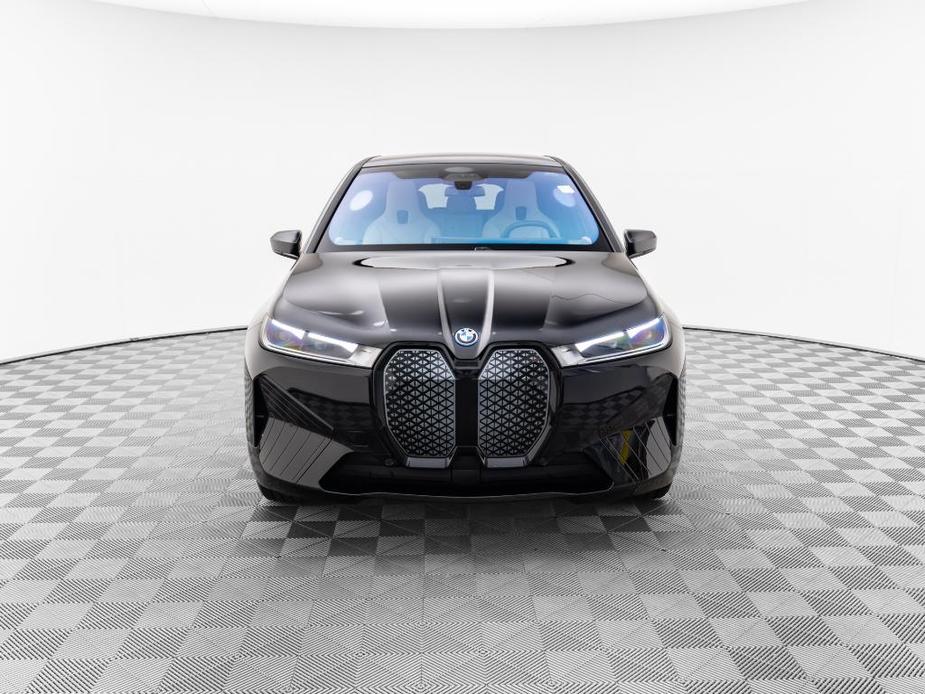 new 2024 BMW iX car, priced at $97,095