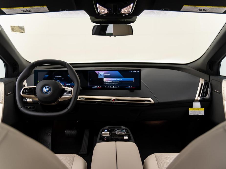 new 2024 BMW iX car, priced at $97,095