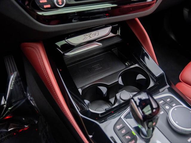 used 2024 BMW X4 car, priced at $48,600