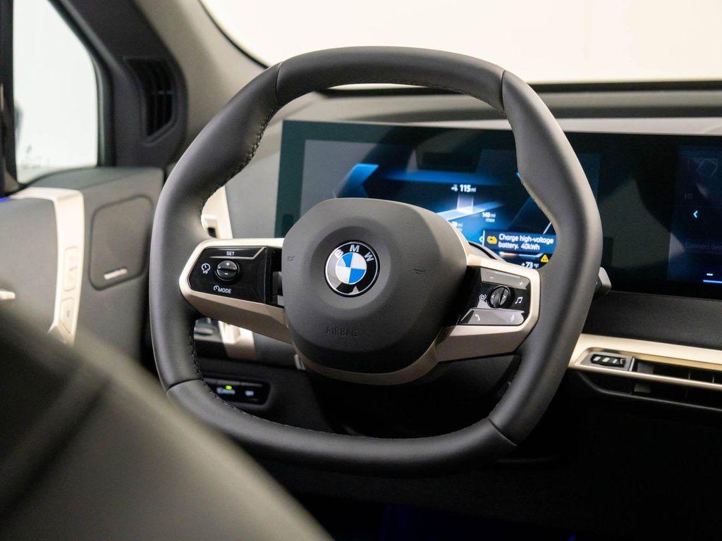 new 2026 BMW iX car, priced at $97,825