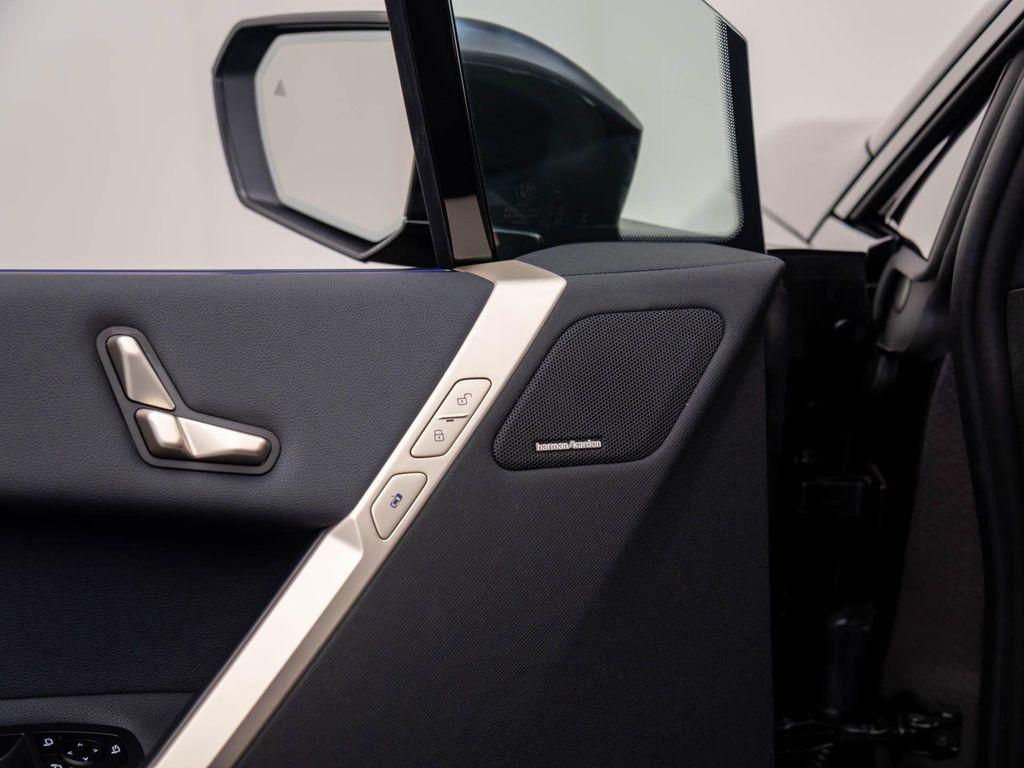 new 2026 BMW iX car, priced at $97,825