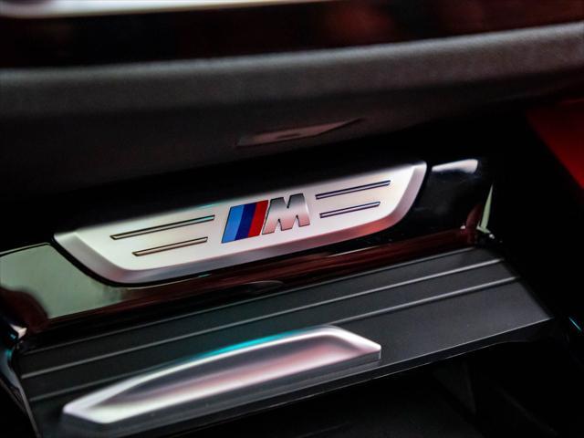 used 2021 BMW X4 M car, priced at $46,500