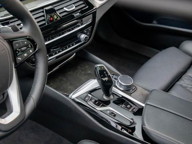 used 2023 BMW 530e car, priced at $39,900
