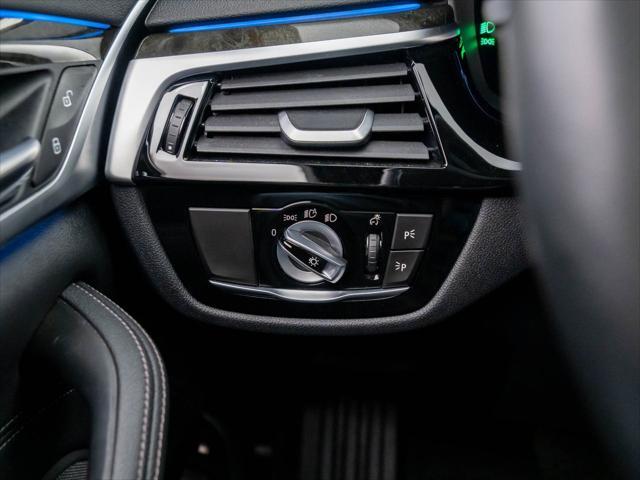 used 2023 BMW 530e car, priced at $39,900