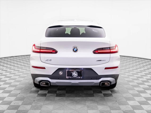 used 2024 BMW X4 car, priced at $48,900