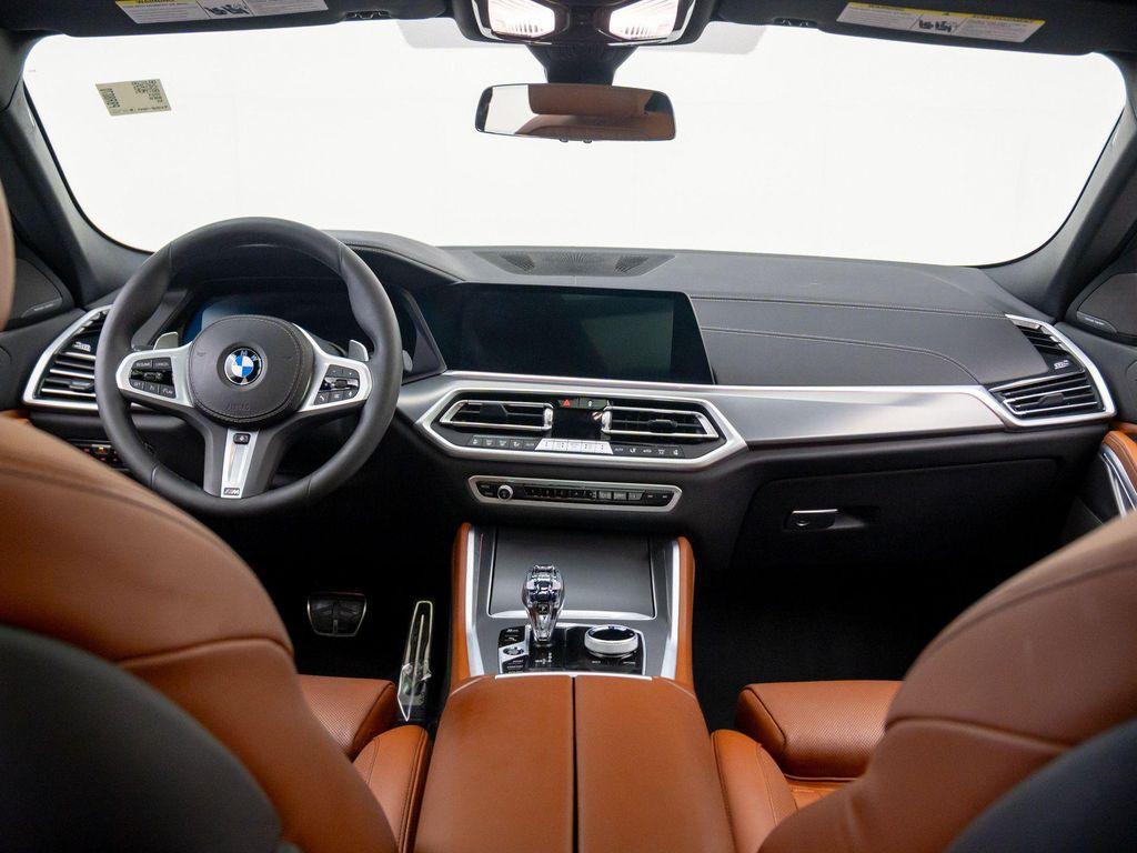 used 2023 BMW X6 car, priced at $62,900