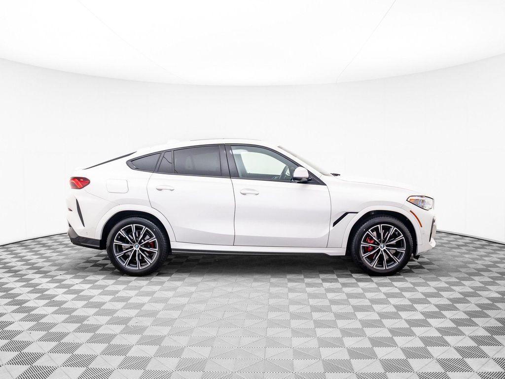 used 2023 BMW X6 car, priced at $62,900