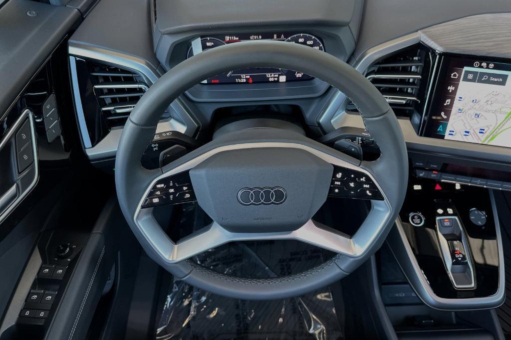 new 2024 Audi Q4 e-tron car, priced at $56,000