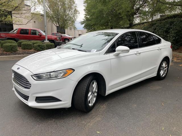 used 2016 Ford Fusion car, priced at $6,995