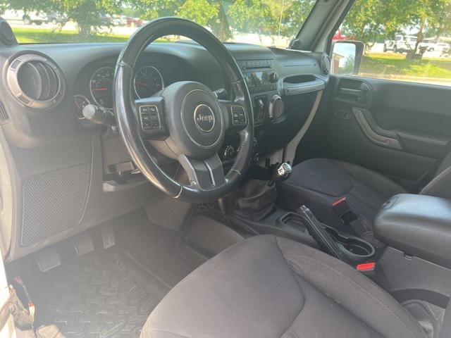 used 2013 Jeep Wrangler Unlimited car, priced at $12,879