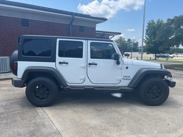 used 2013 Jeep Wrangler Unlimited car, priced at $12,879