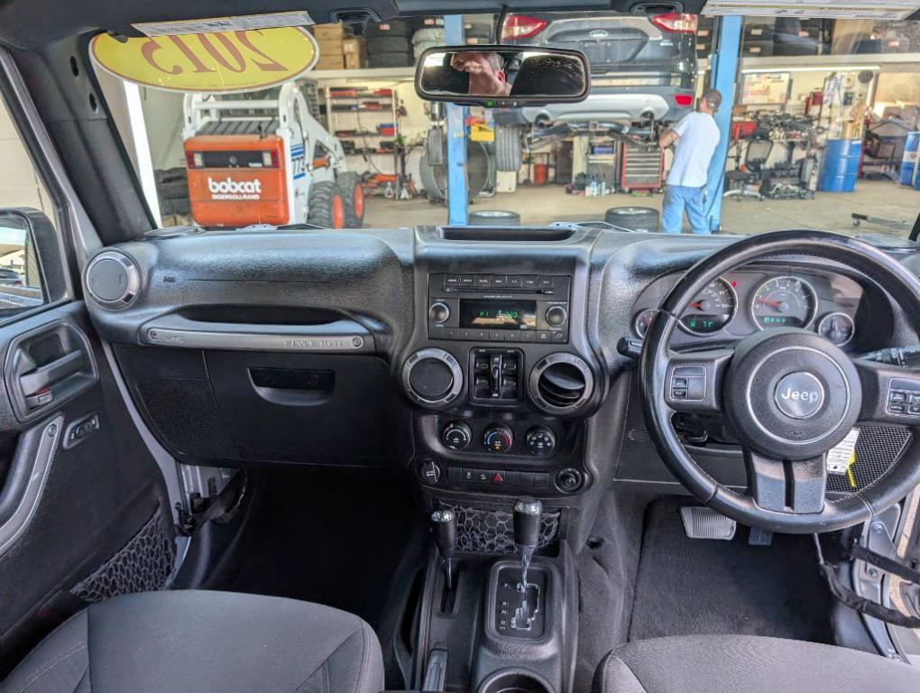 used 2015 Jeep Wrangler Unlimited car, priced at $16,900