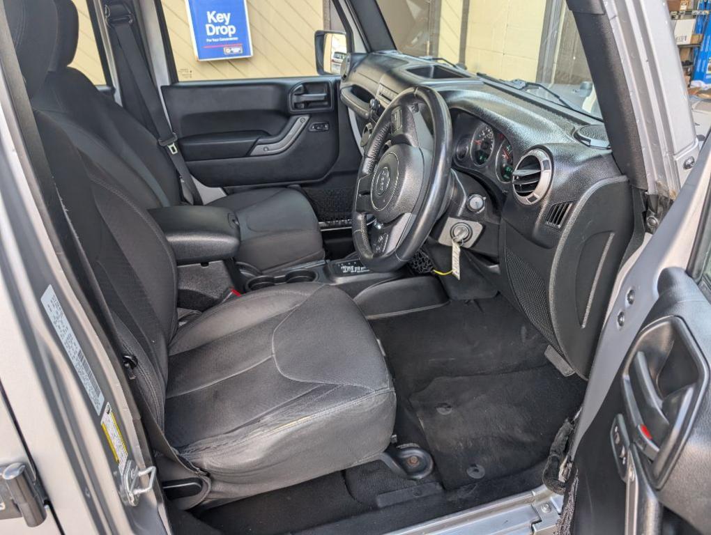 used 2015 Jeep Wrangler Unlimited car, priced at $16,900