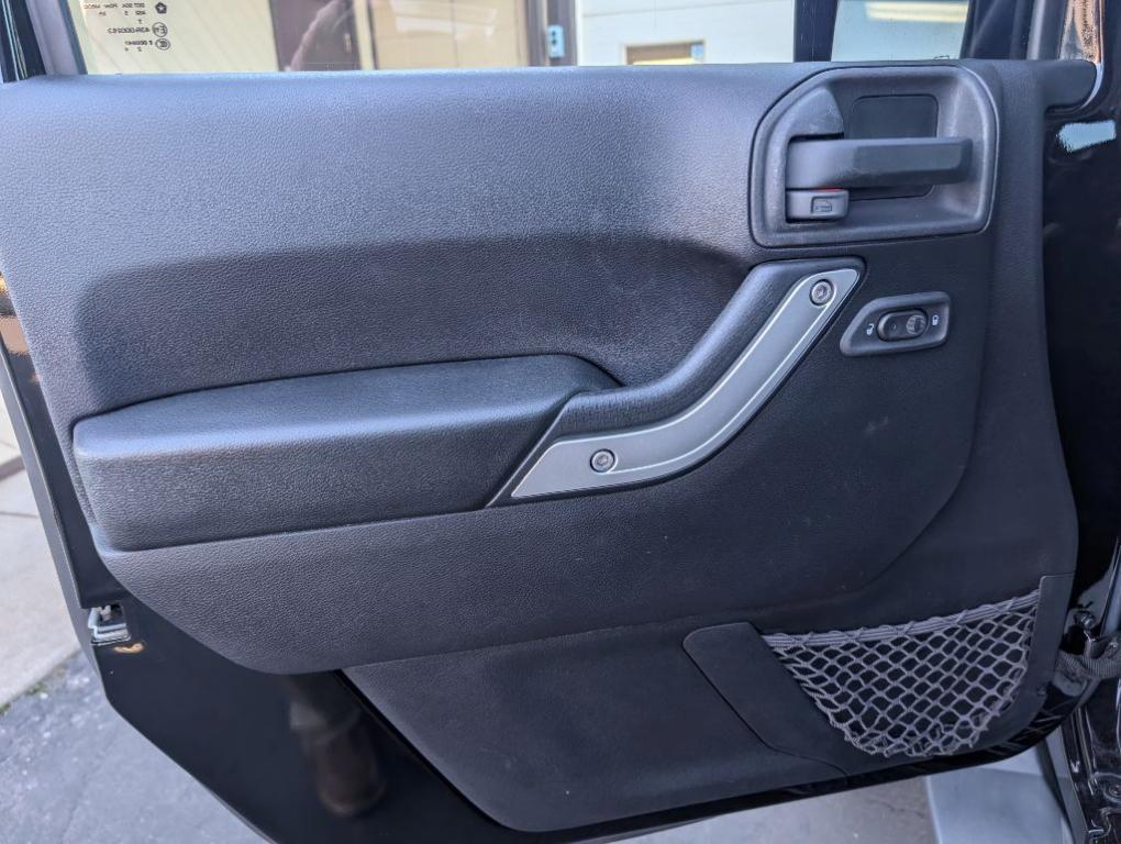 used 2015 Jeep Wrangler Unlimited car, priced at $20,900