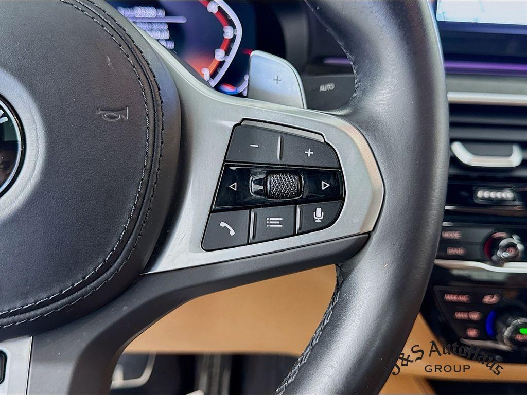 used 2023 BMW M550 car, priced at $61,995