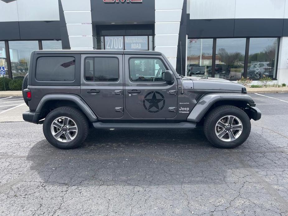 used 2021 Jeep Wrangler Unlimited car, priced at $35,476