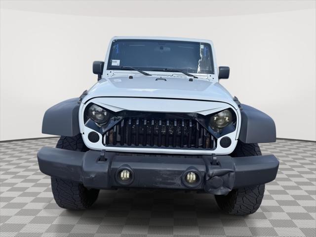 used 2012 Jeep Wrangler Unlimited car, priced at $13,995
