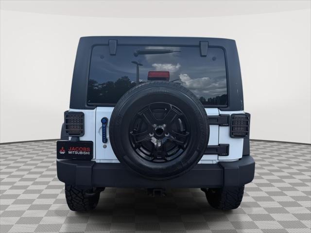 used 2012 Jeep Wrangler Unlimited car, priced at $13,995