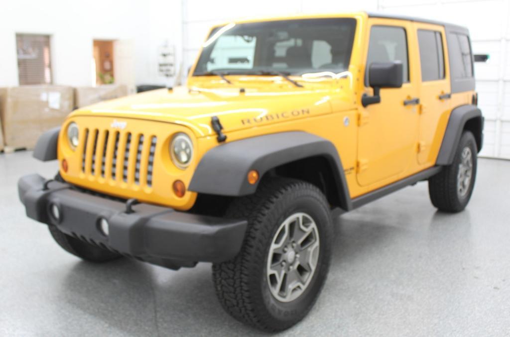 used 2013 Jeep Wrangler Unlimited car, priced at $18,788
