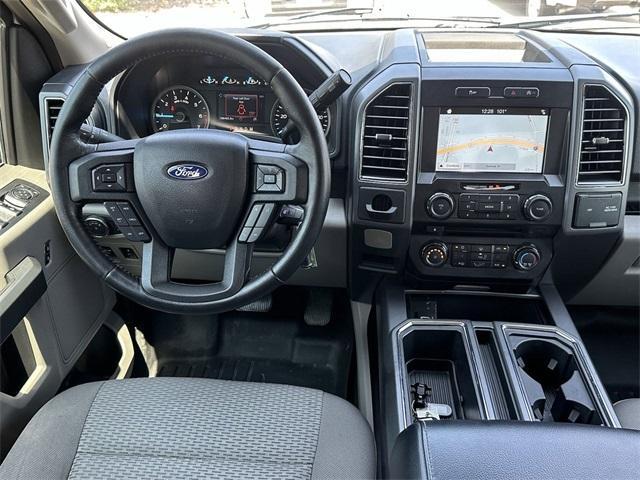 used 2018 Ford F-150 car, priced at $23,104