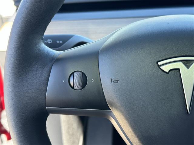 used 2024 Tesla Model Y car, priced at $31,938