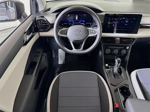 new 2025 Volkswagen Taos car, priced at $26,396
