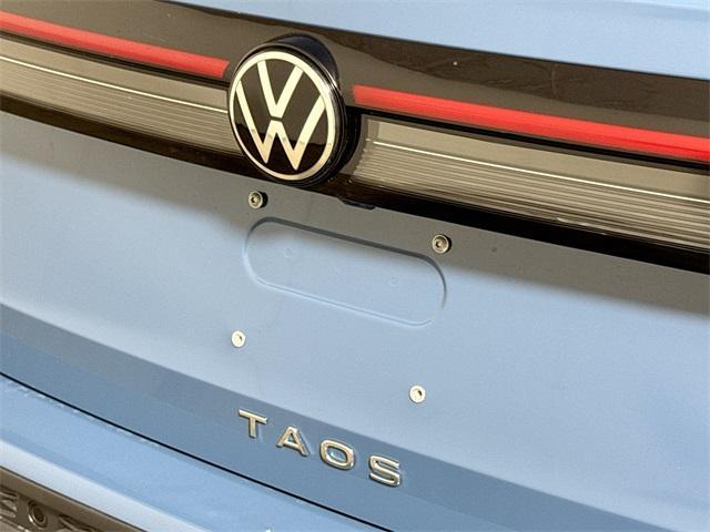 new 2025 Volkswagen Taos car, priced at $31,599