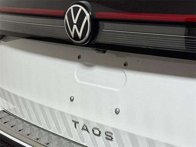 new 2025 Volkswagen Taos car, priced at $26,396