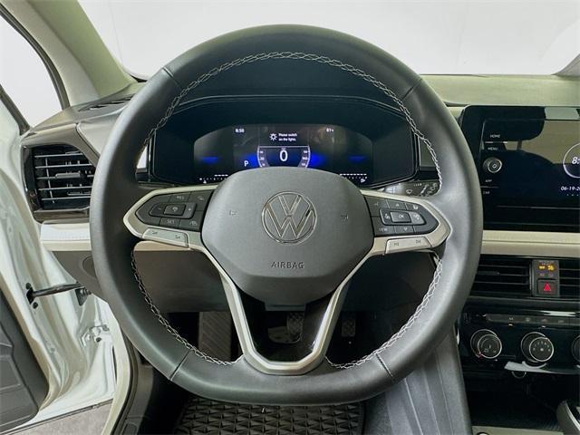 new 2025 Volkswagen Taos car, priced at $26,396