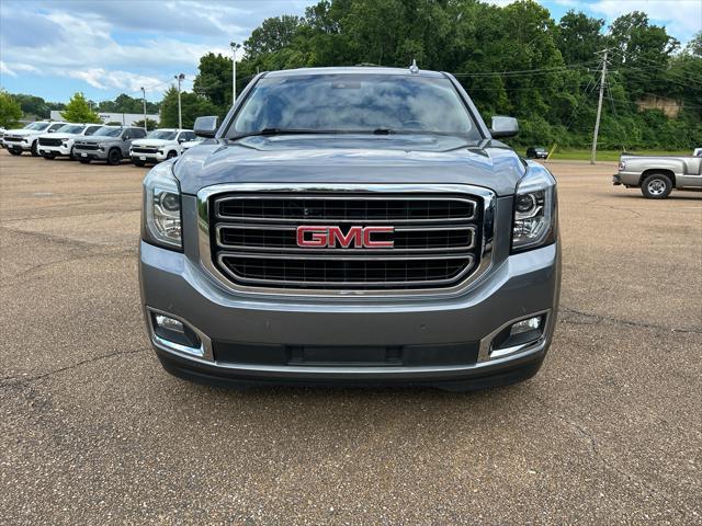 used 2018 GMC Yukon car, priced at $27,183