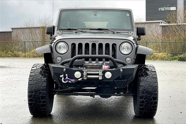 used 2016 Jeep Wrangler Unlimited car, priced at $18,491