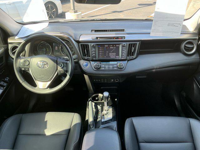 used 2018 Toyota RAV4 Hybrid car, priced at $27,444