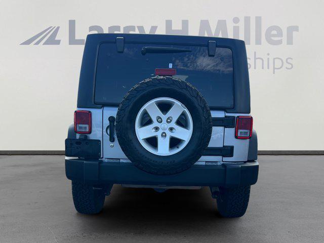 used 2018 Jeep Wrangler JK Unlimited car, priced at $19,898