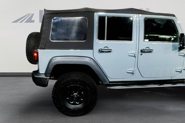 used 2014 Jeep Wrangler Unlimited car, priced at $18,994