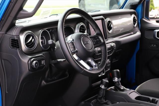 used 2023 Jeep Wrangler car, priced at $38,287
