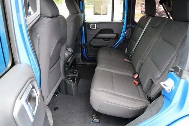 used 2023 Jeep Wrangler car, priced at $38,287