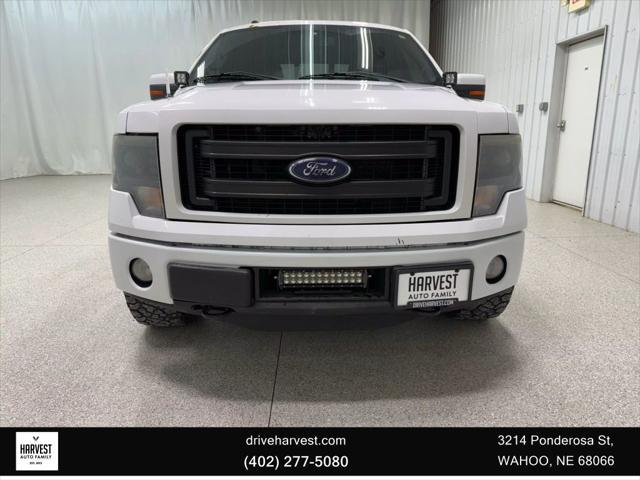 used 2014 Ford F-150 car, priced at $12,900