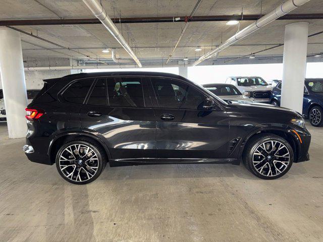 used 2022 BMW X5 M car, priced at $74,900