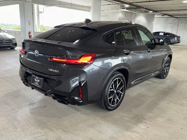 used 2023 BMW X4 car, priced at $56,500