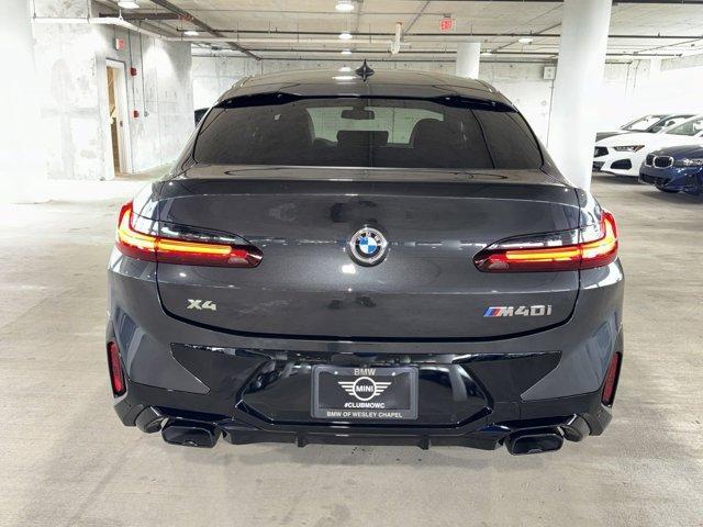 used 2023 BMW X4 car, priced at $56,500