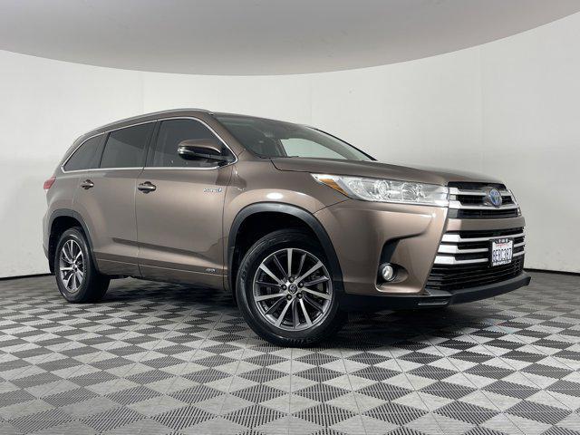 used 2018 Toyota Highlander Hybrid car, priced at $34,435